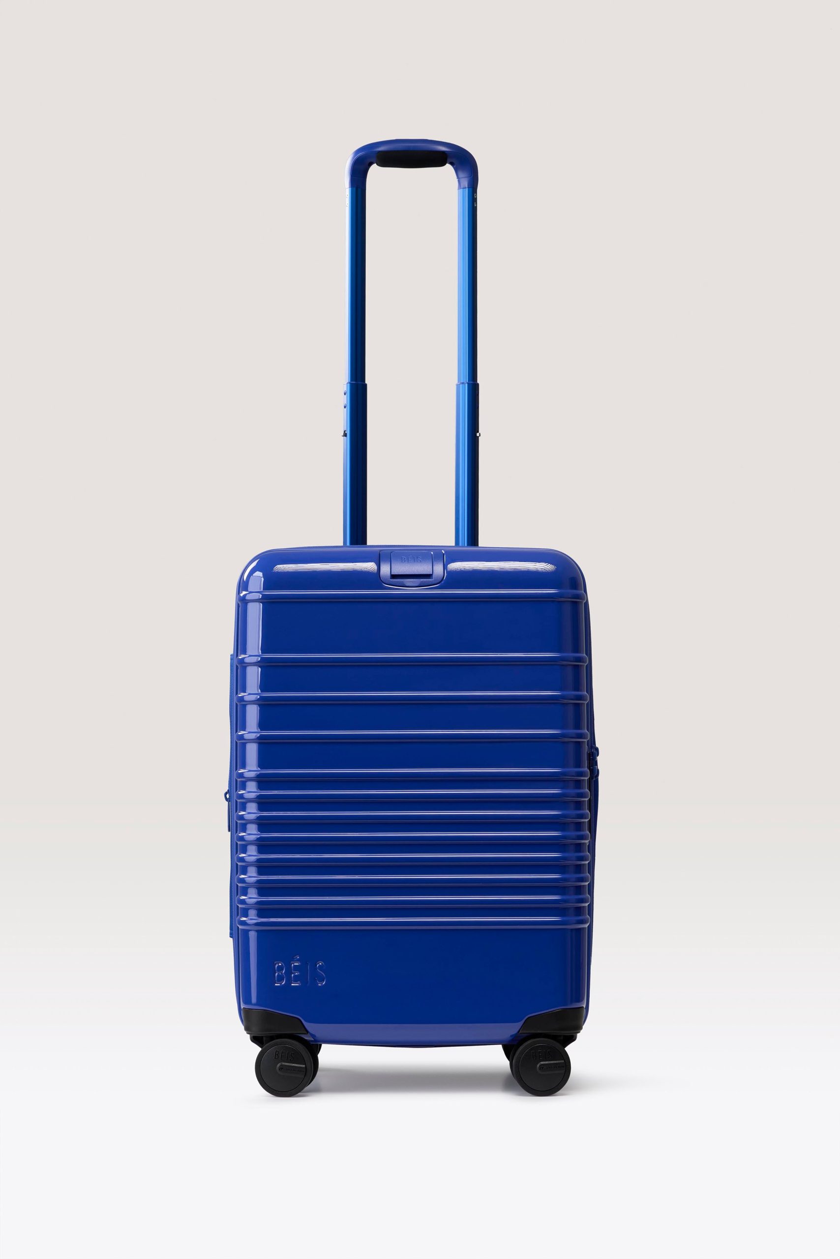 The Carry-On Roller in Glossy Cobalt Blue